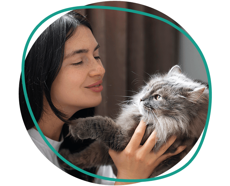 woman petting her cat